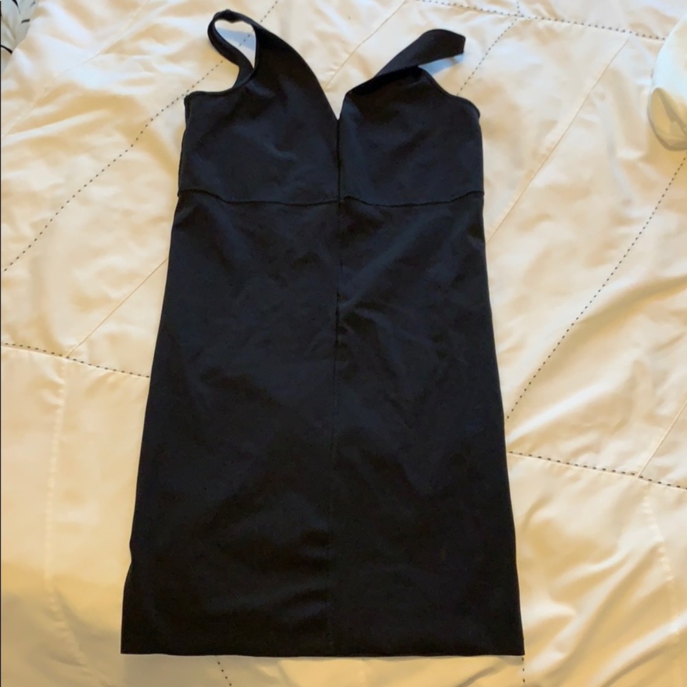 Implicite body suit that goes under a dress